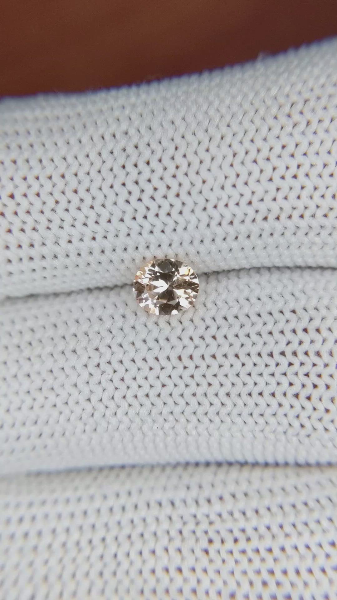 0.58 Ct. Peach Sapphire from Ceylon (Sri Lanka) Size Video