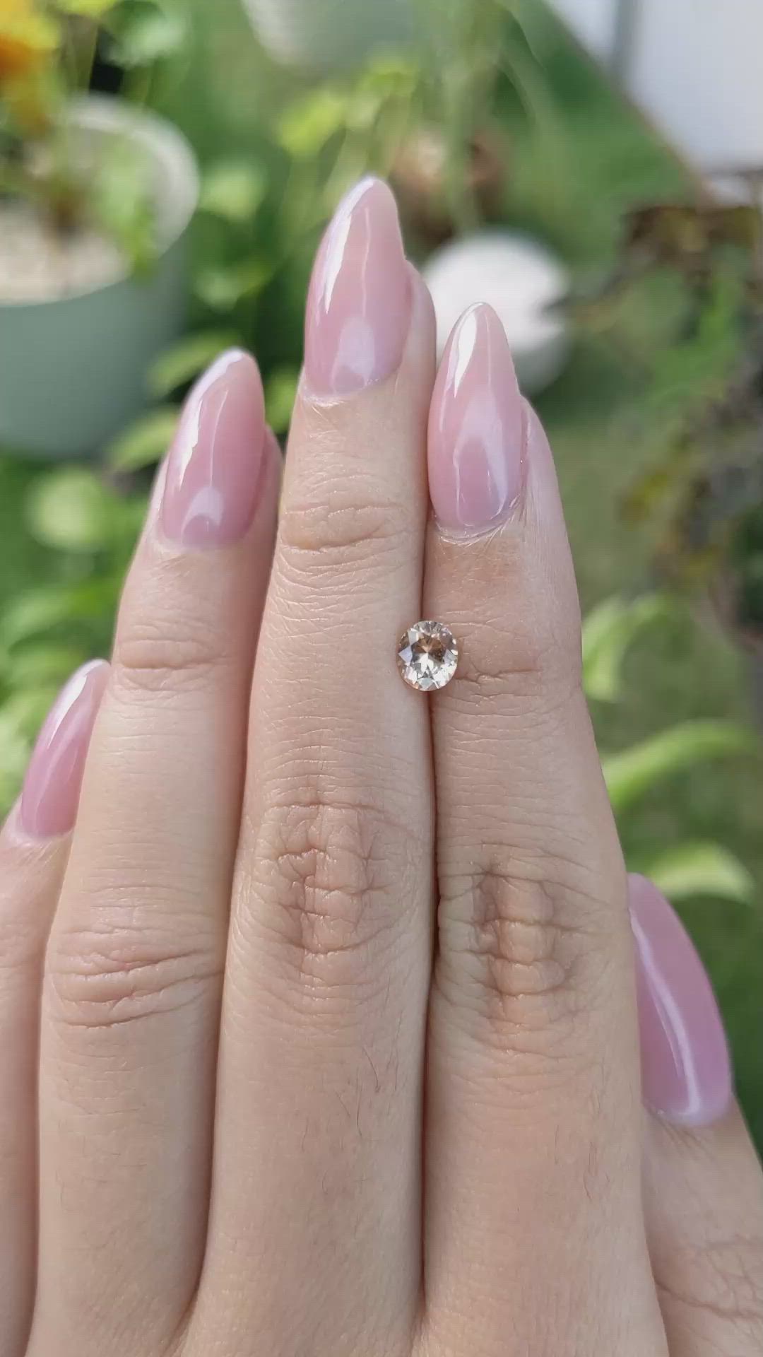 0.58 Ct. Peach Sapphire from Ceylon (Sri Lanka) Size Video