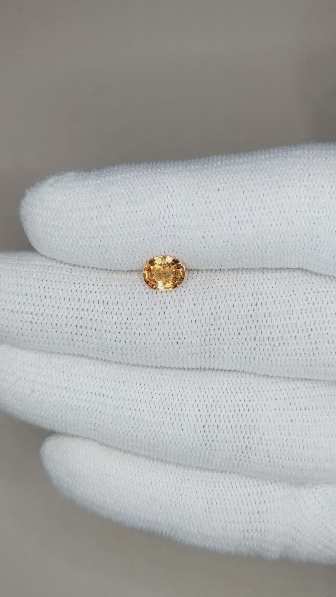 0.97 Ct. Yellowish Orange Sapphire from Ceylon (Sri Lanka) Size Video
