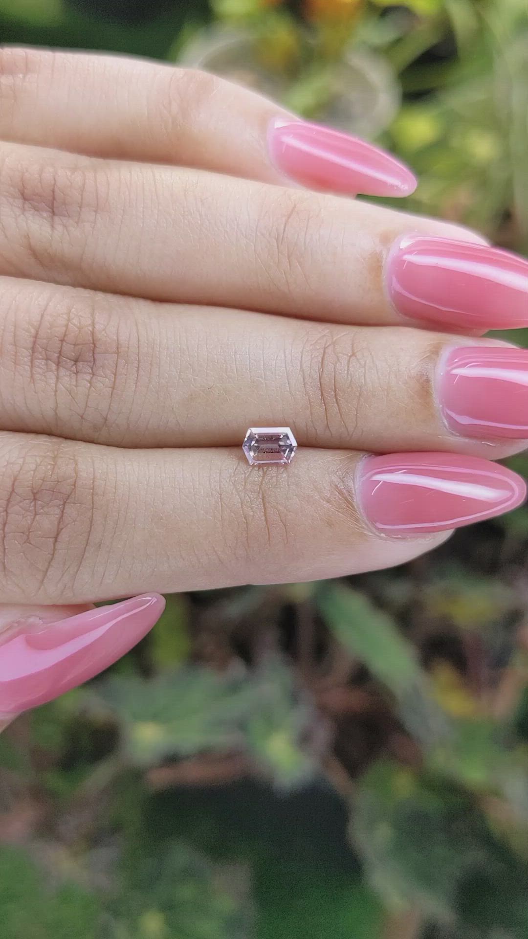 0.56 Ct. Peach Sapphire from Ceylon (Sri Lanka) Size Video