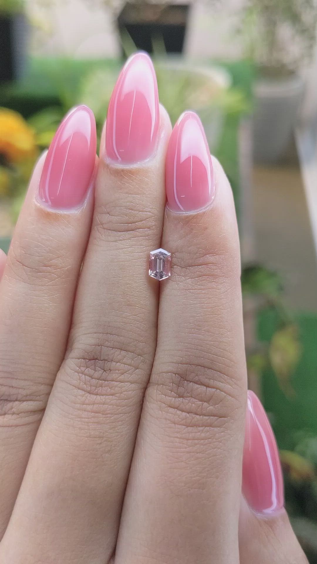 0.56 Ct. Peach Sapphire from Ceylon (Sri Lanka) Size Video