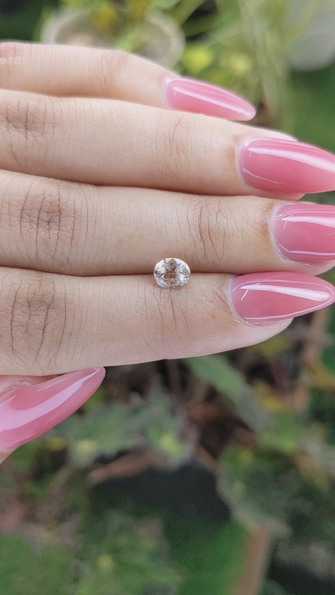 0.85 Ct. Peach Sapphire from Ceylon (Sri Lanka) Size Video