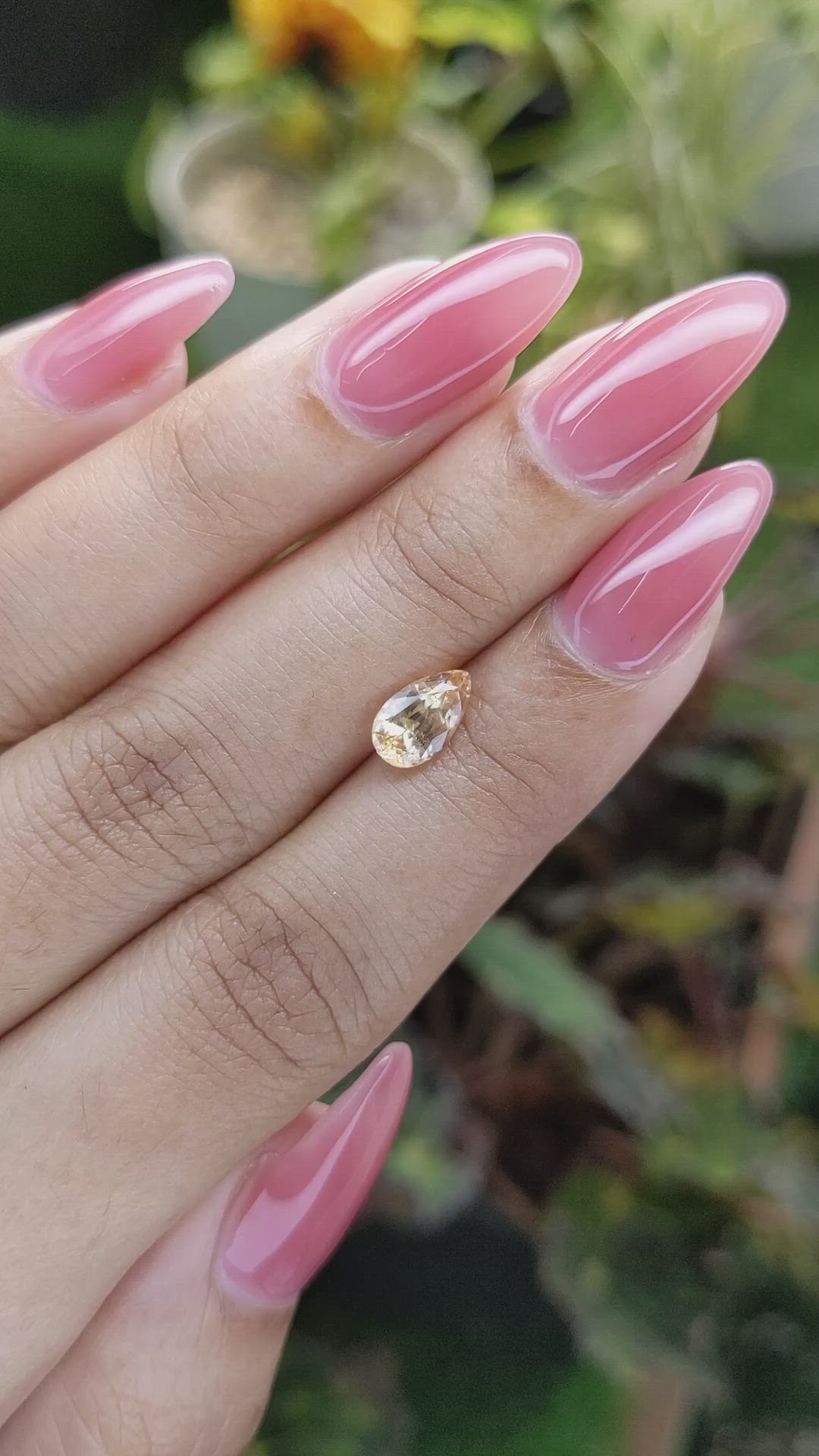 1.25 Ct. Peach Sapphire from Ceylon (Sri Lanka) Size Video