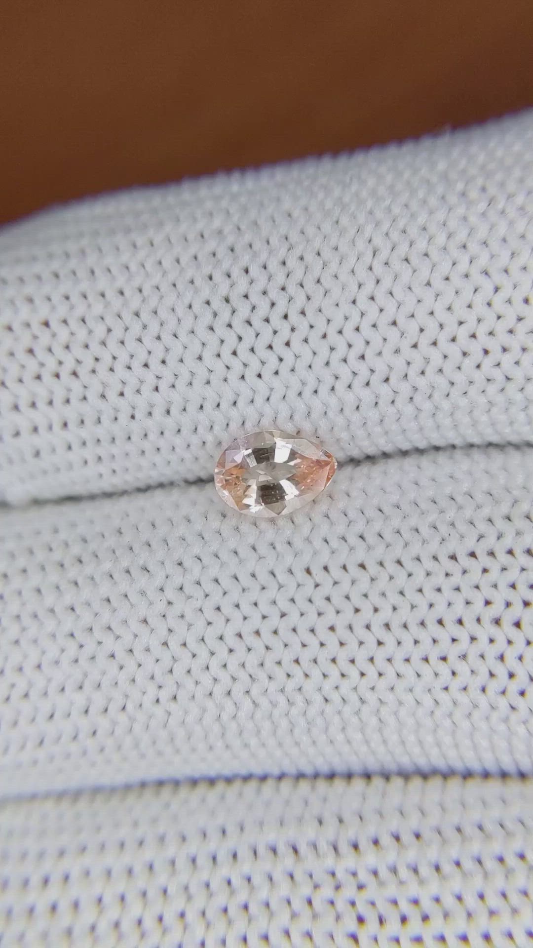 0.64 Ct. Peach Sapphire from Ceylon (Sri Lanka) Size Video