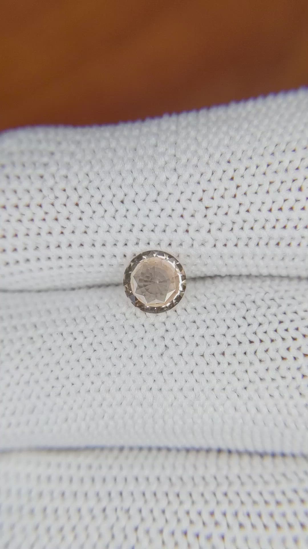 0.71 Ct. Peach Sapphire from Ceylon (Sri Lanka) Size Video