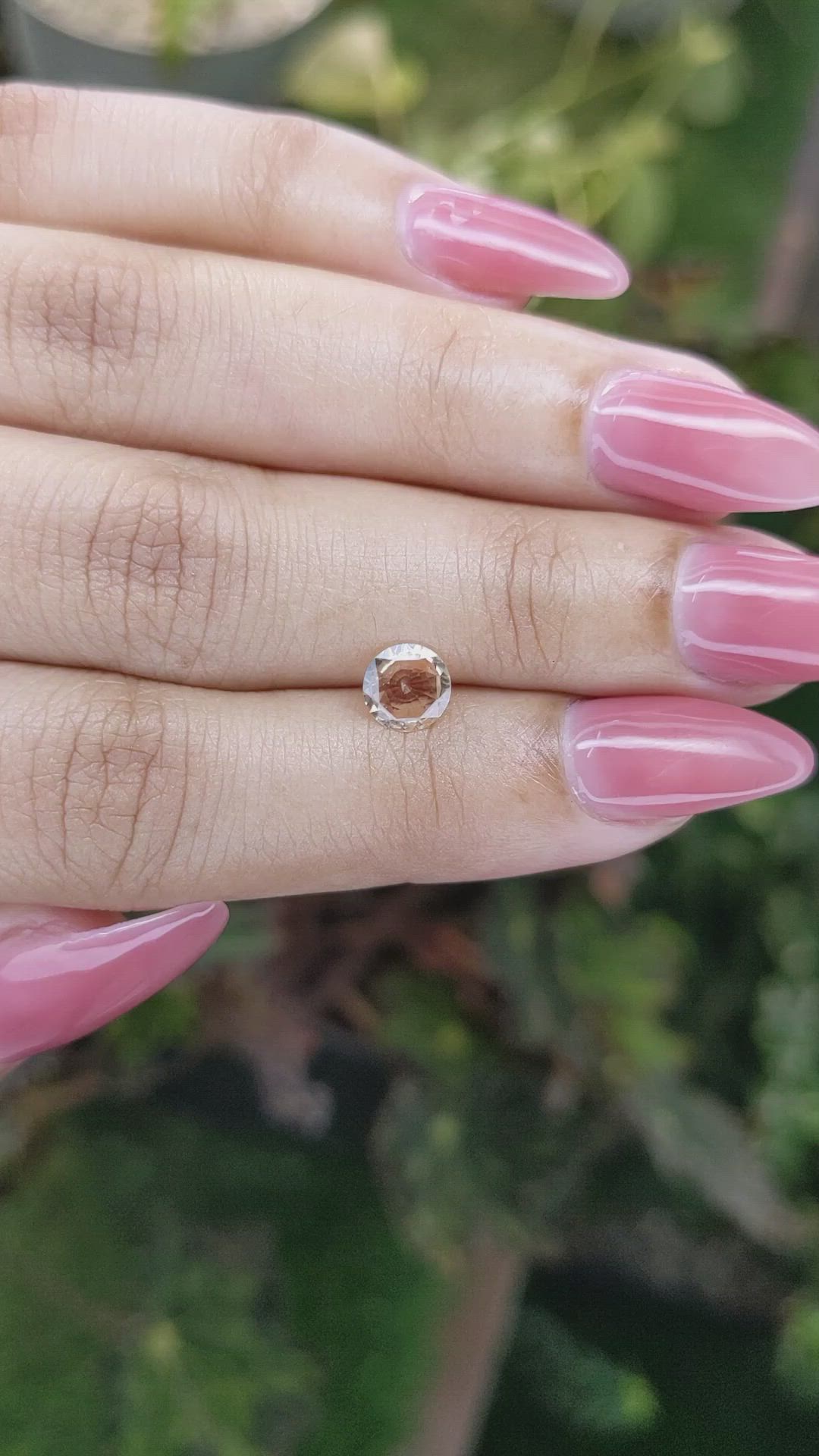 0.71 Ct. Peach Sapphire from Ceylon (Sri Lanka) Size Video