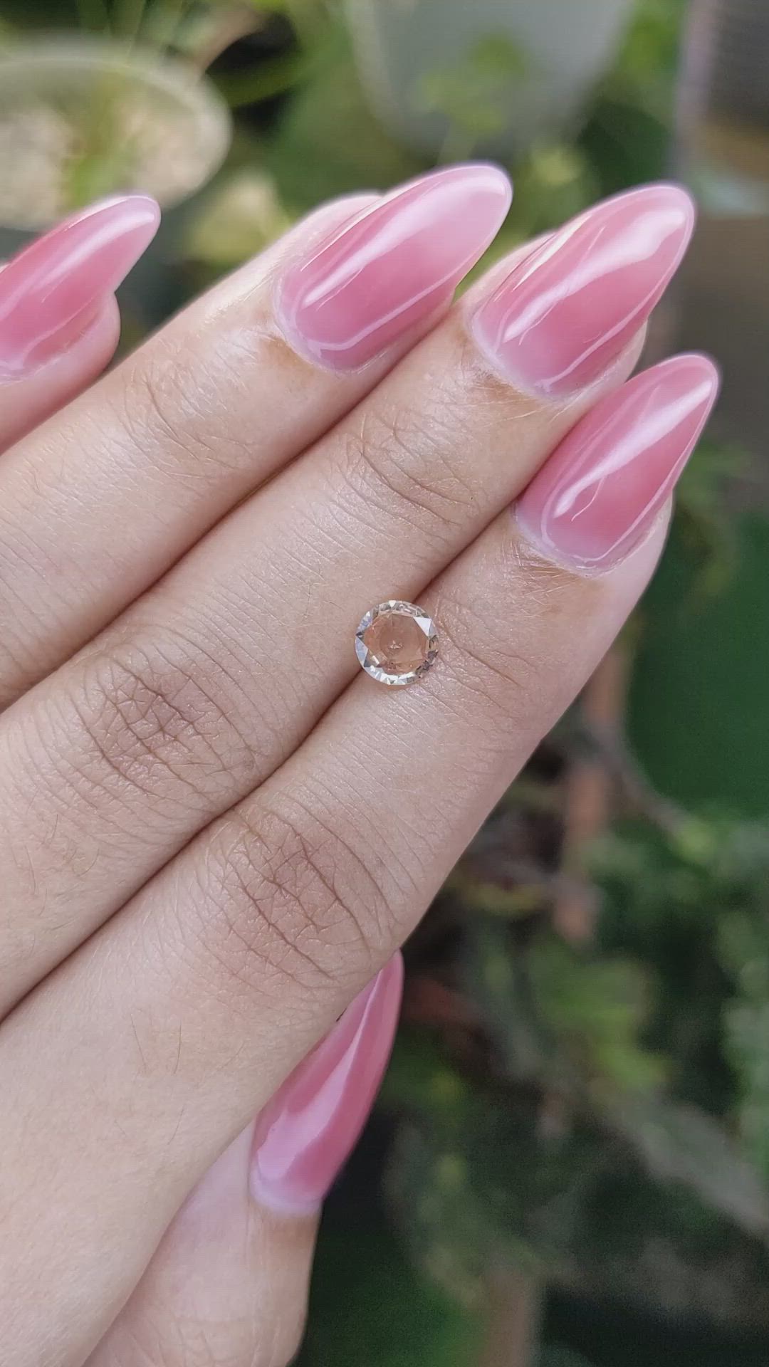 0.71 Ct. Peach Sapphire from Ceylon (Sri Lanka) Size Video