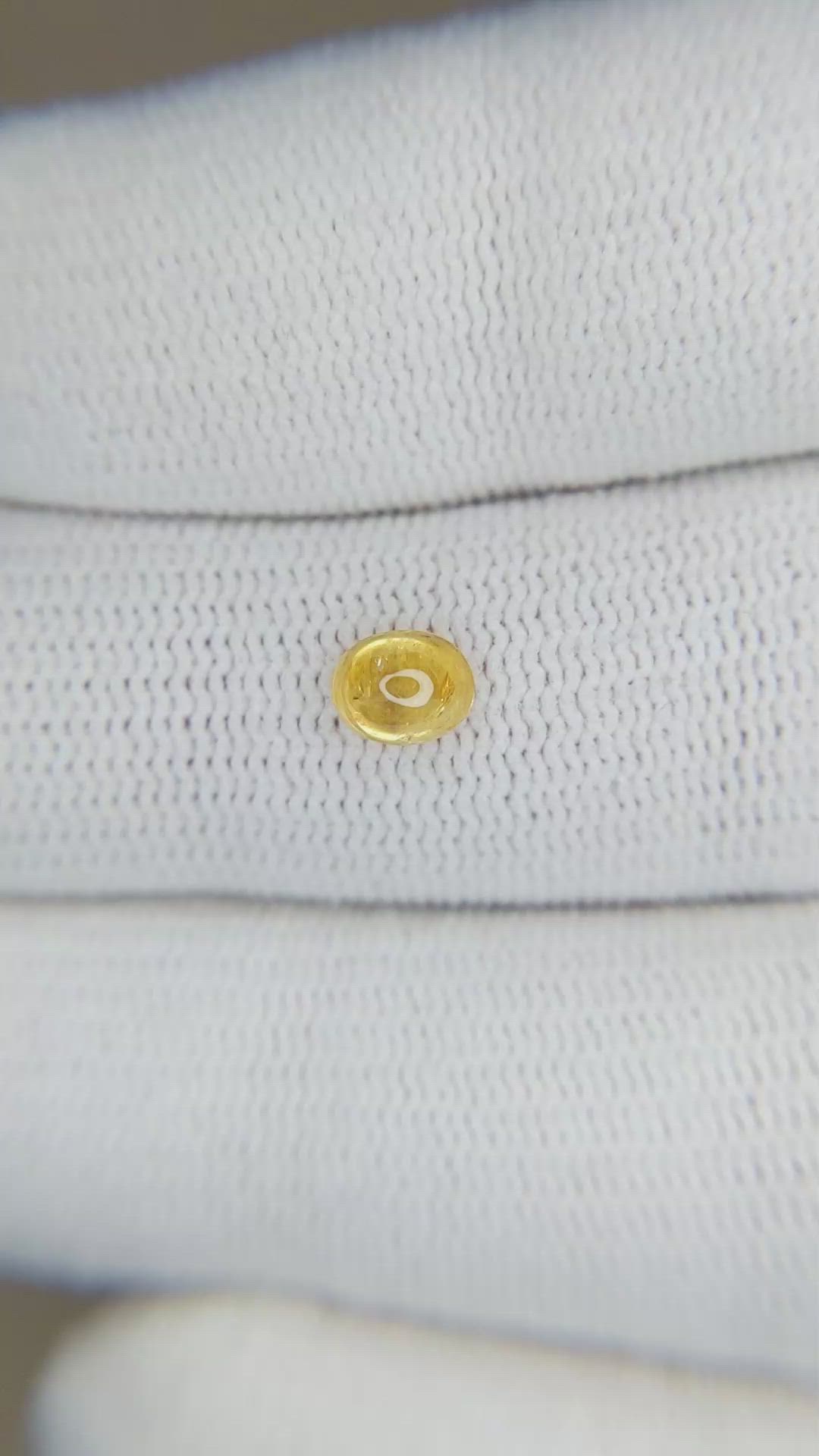 0.61 Ct. Yellow Cabochon Sapphire from Ceylon (Sri Lanka) Size Video