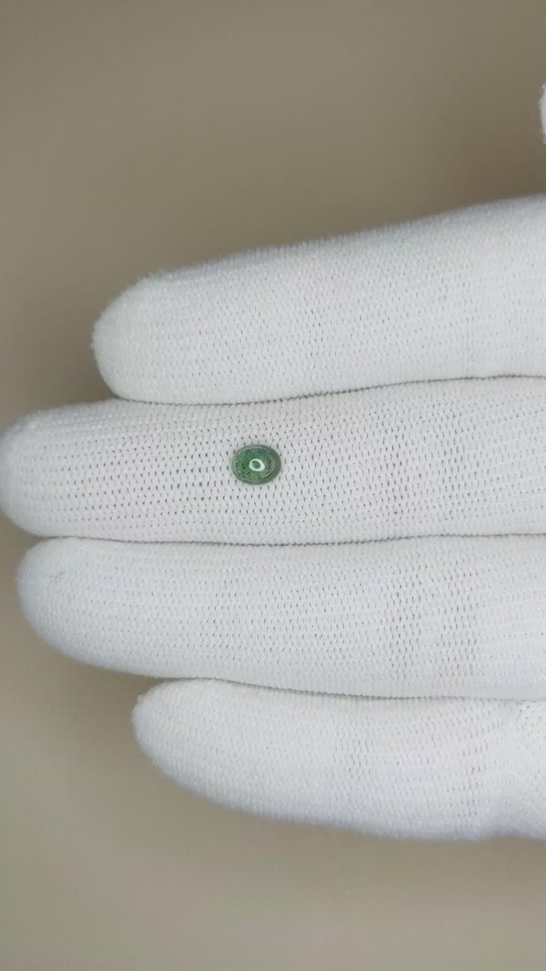 0.59 Ct. Bluish Green Cabochon Sapphire from Ceylon (Sri Lanka) Size Video