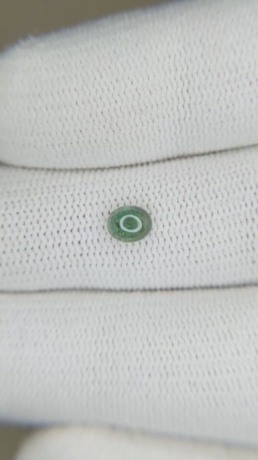 0.59 Ct. Bluish Green Cabochon Sapphire from Ceylon (Sri Lanka) Size Video