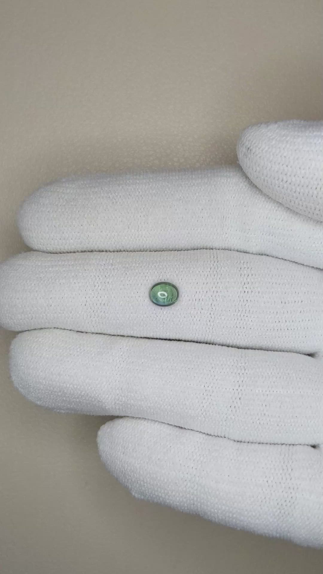 0.59 Ct. Bluish Green Cabochon Sapphire from Ceylon (Sri Lanka) Size Video