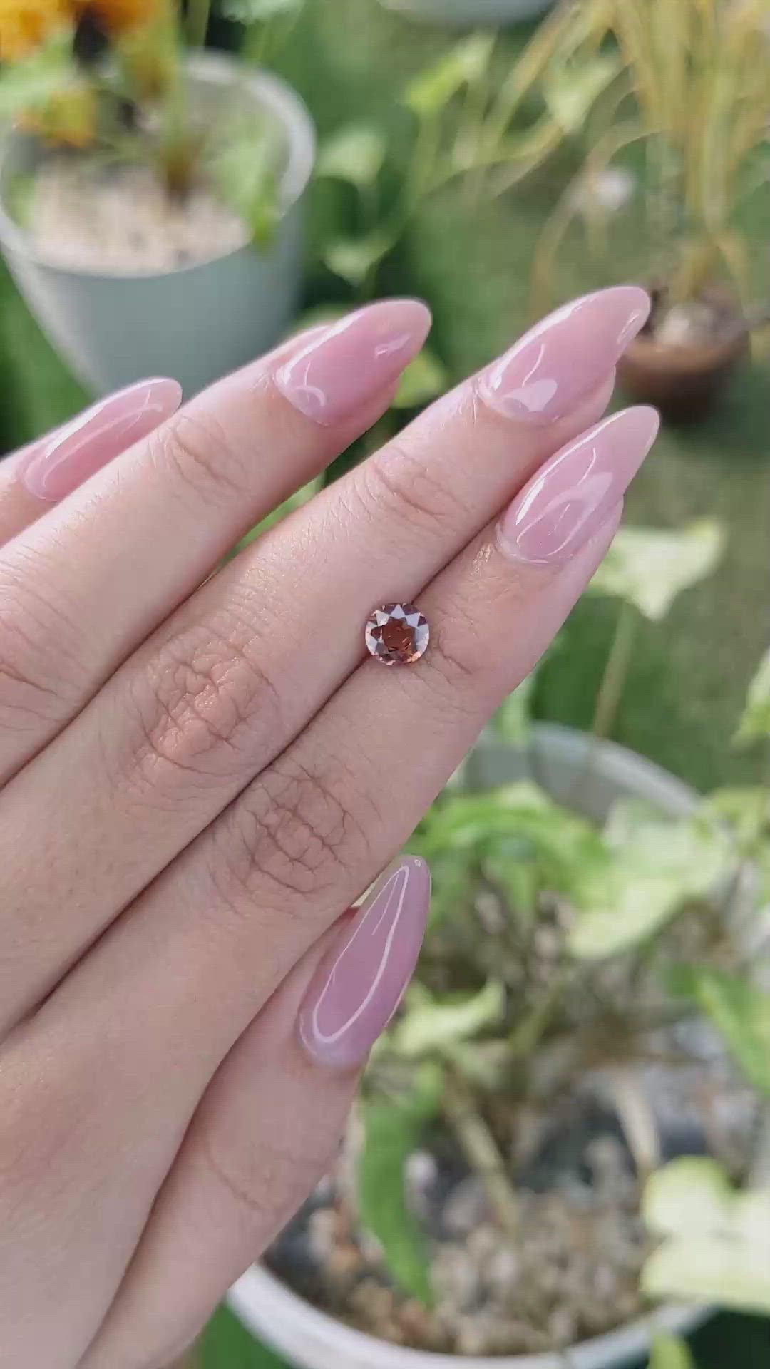 1.02 Ct. Orange Sapphire from Ceylon (Sri Lanka) Size Video