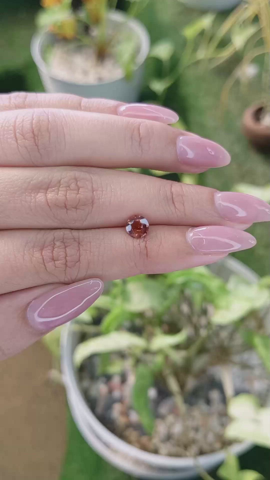 1.02 Ct. Orange Sapphire from Ceylon (Sri Lanka) Size Video