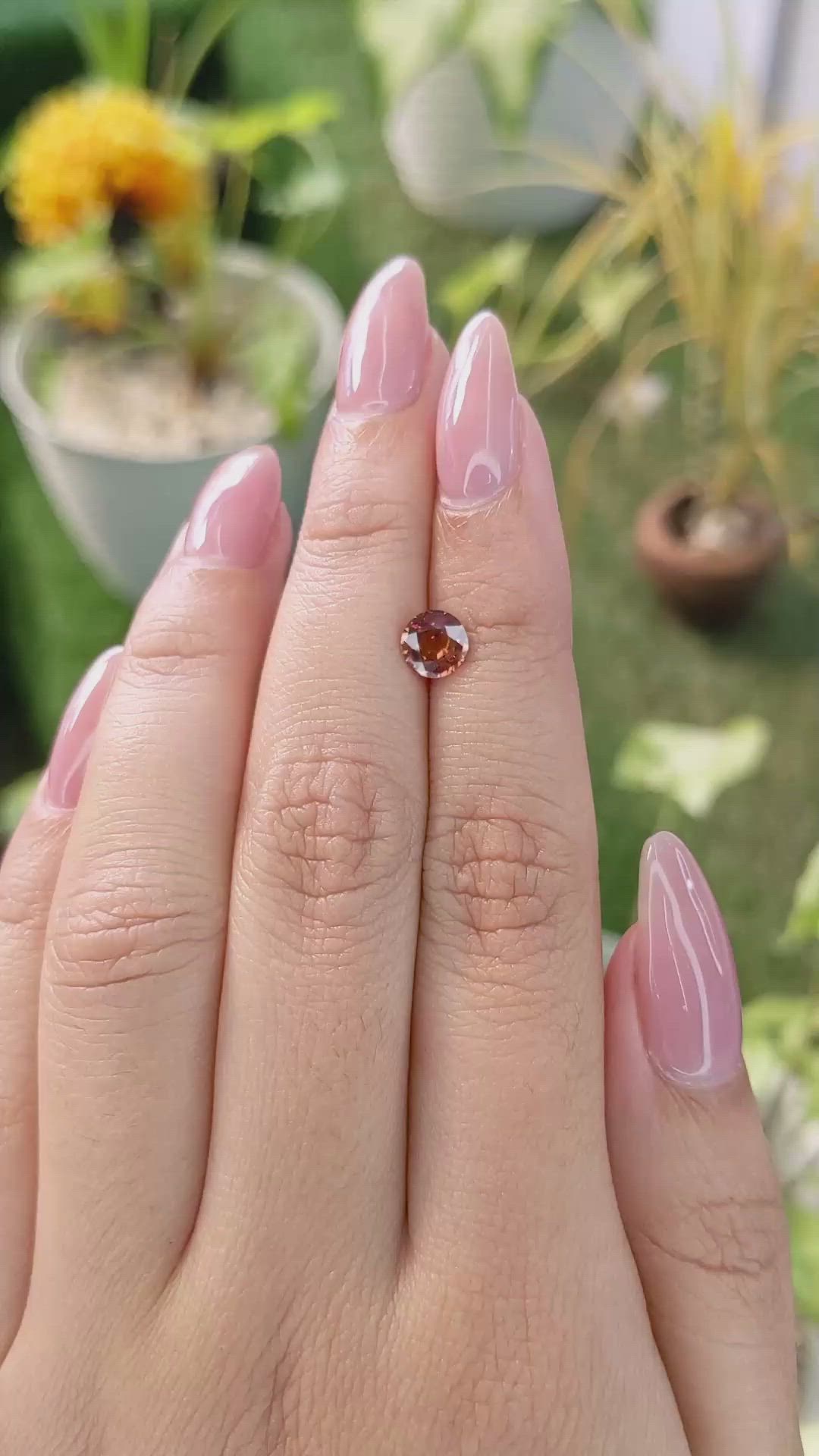 1.02 Ct. Orange Sapphire from Ceylon (Sri Lanka) Size Video