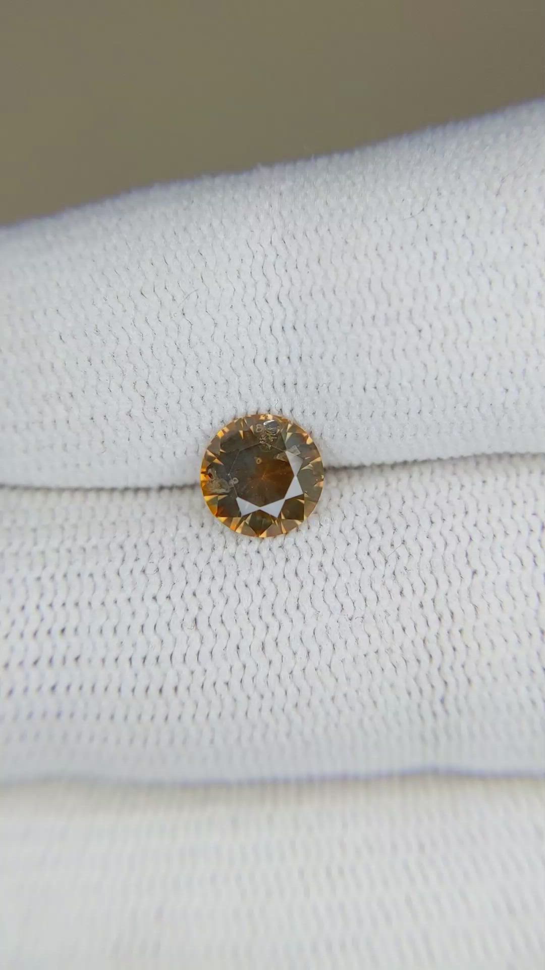 0.67 Ct. Orange Sapphire from Montana Size Video