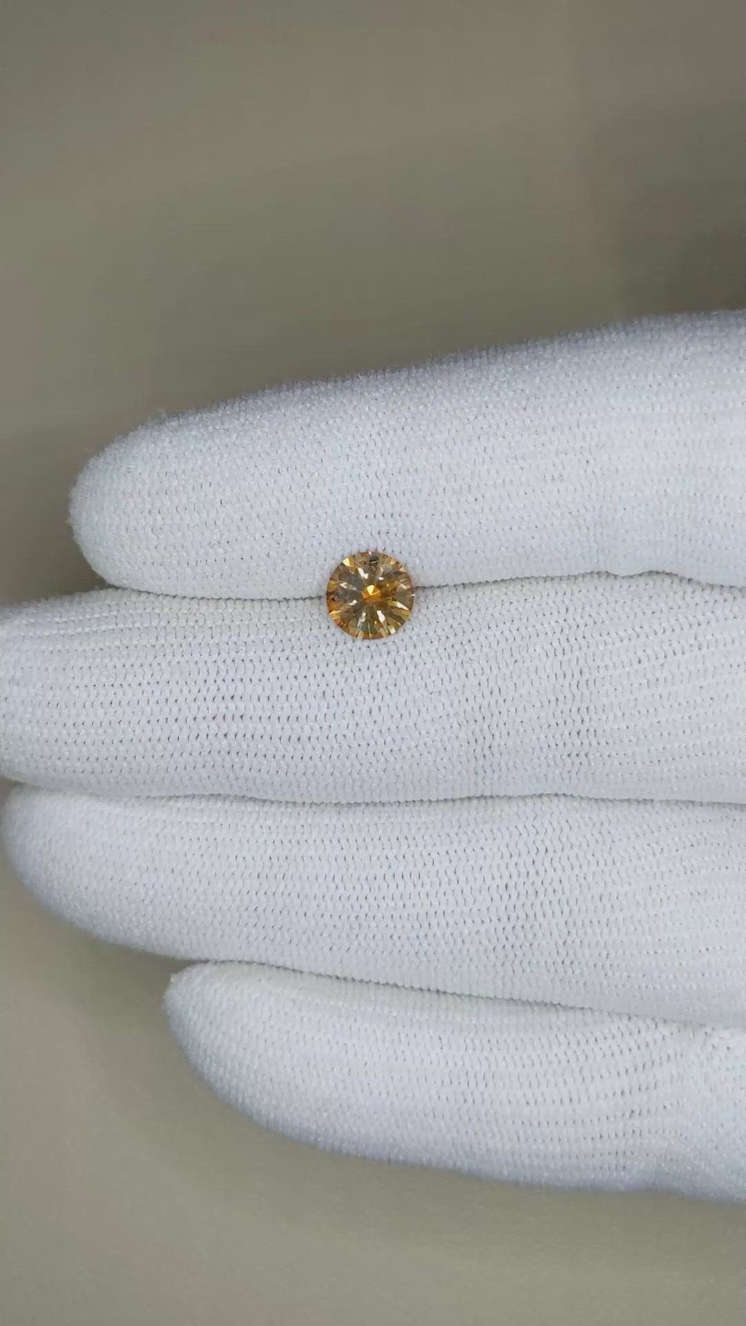 0.67 Ct. Orange Sapphire from Montana Size Video