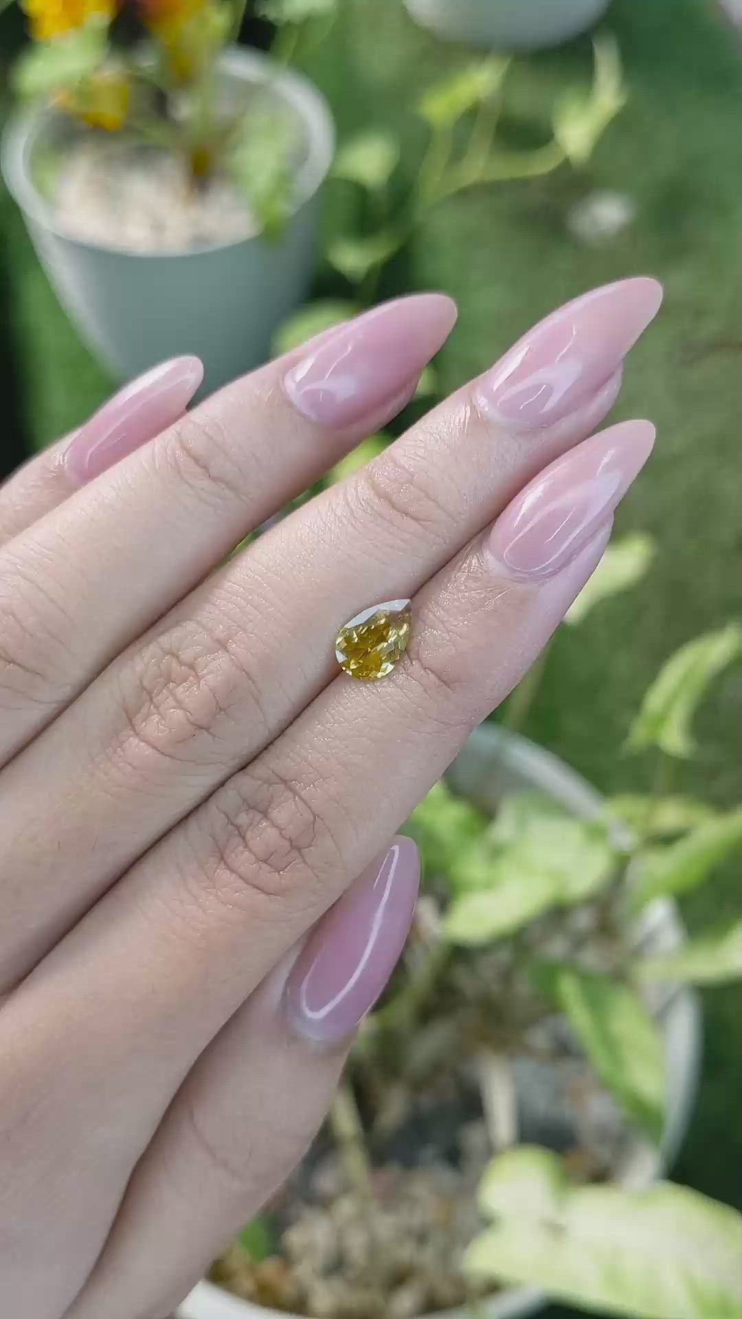 1.17 Ct. Orangish Yellow Sapphire from Ceylon (Sri Lanka) Size Video