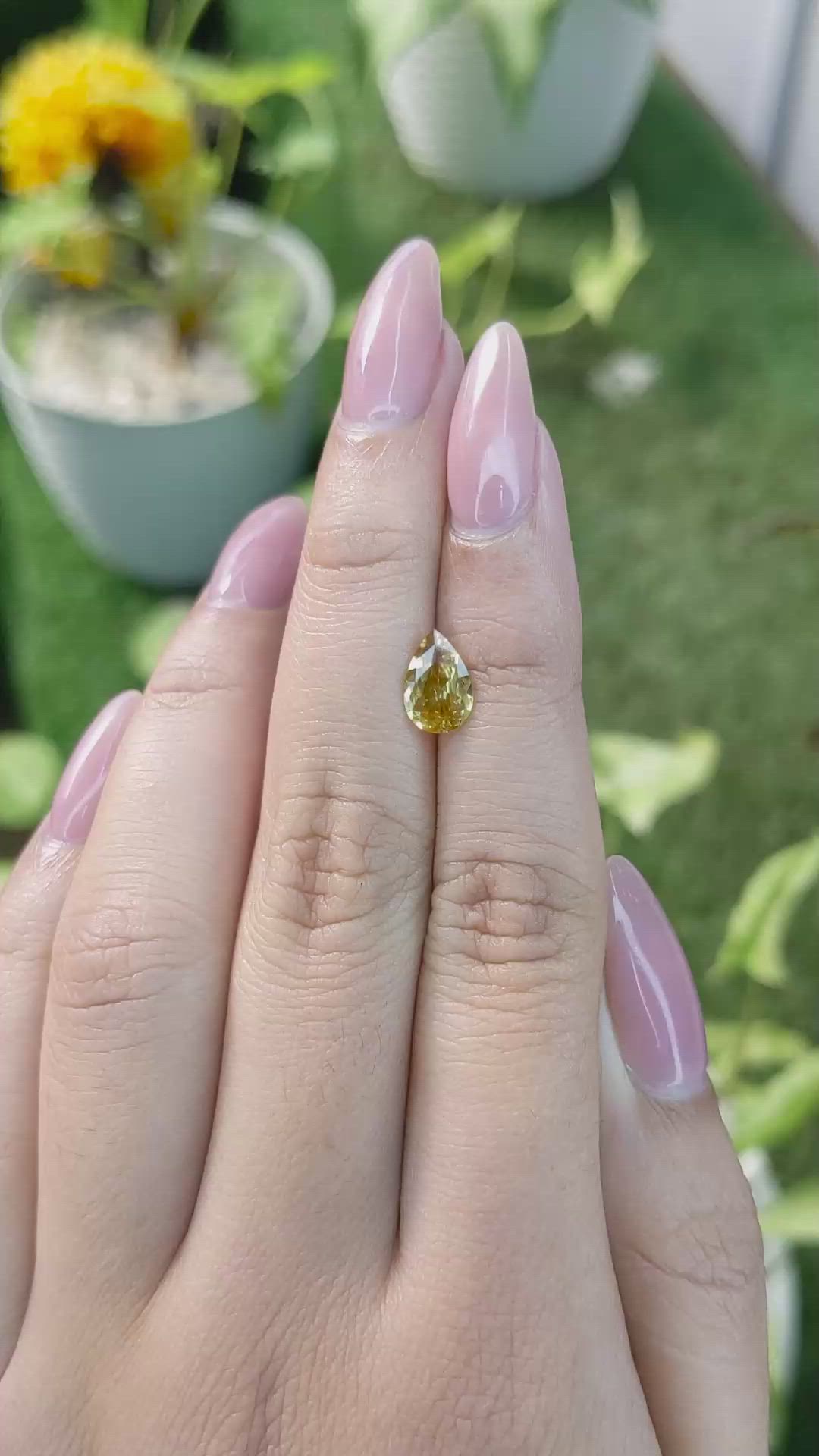 1.17 Ct. Orangish Yellow Sapphire from Ceylon (Sri Lanka) Size Video