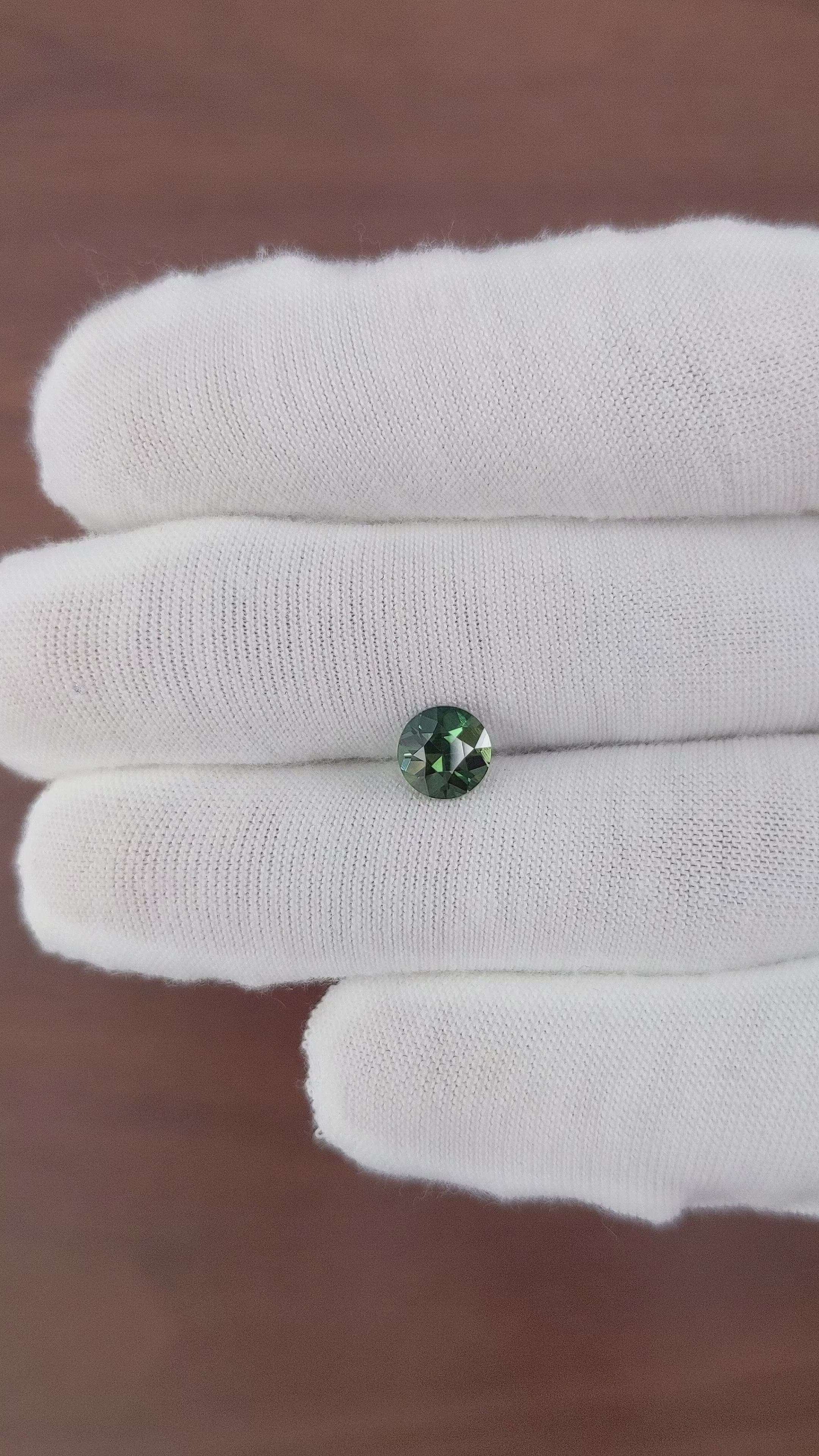 1.55 Ct. Bluish Green Sapphire from Madagascar Size Video