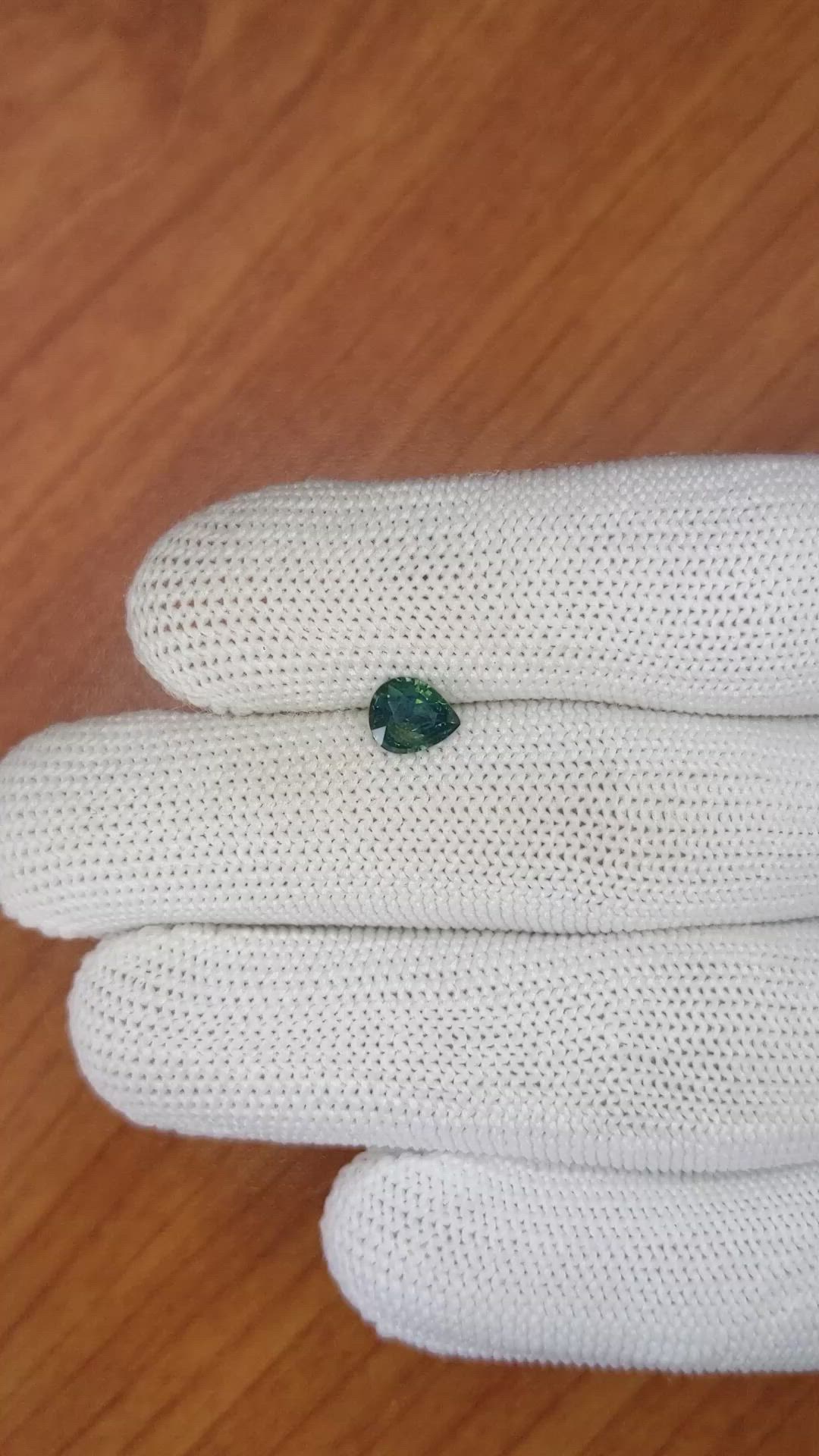 0.80 Ct. Bluish Green Sapphire from Madagascar Size Video