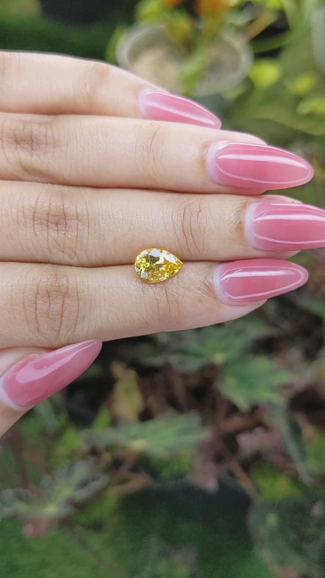 2.09 Ct. Orangish Yellow Sapphire from Ceylon (Sri Lanka) Size Video