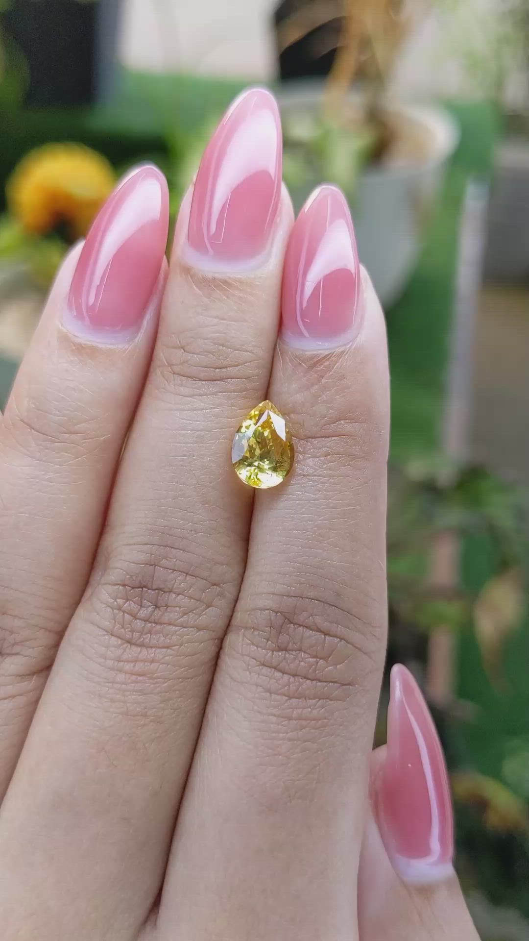 2.09 Ct. Orangish Yellow Sapphire from Ceylon (Sri Lanka) Size Video