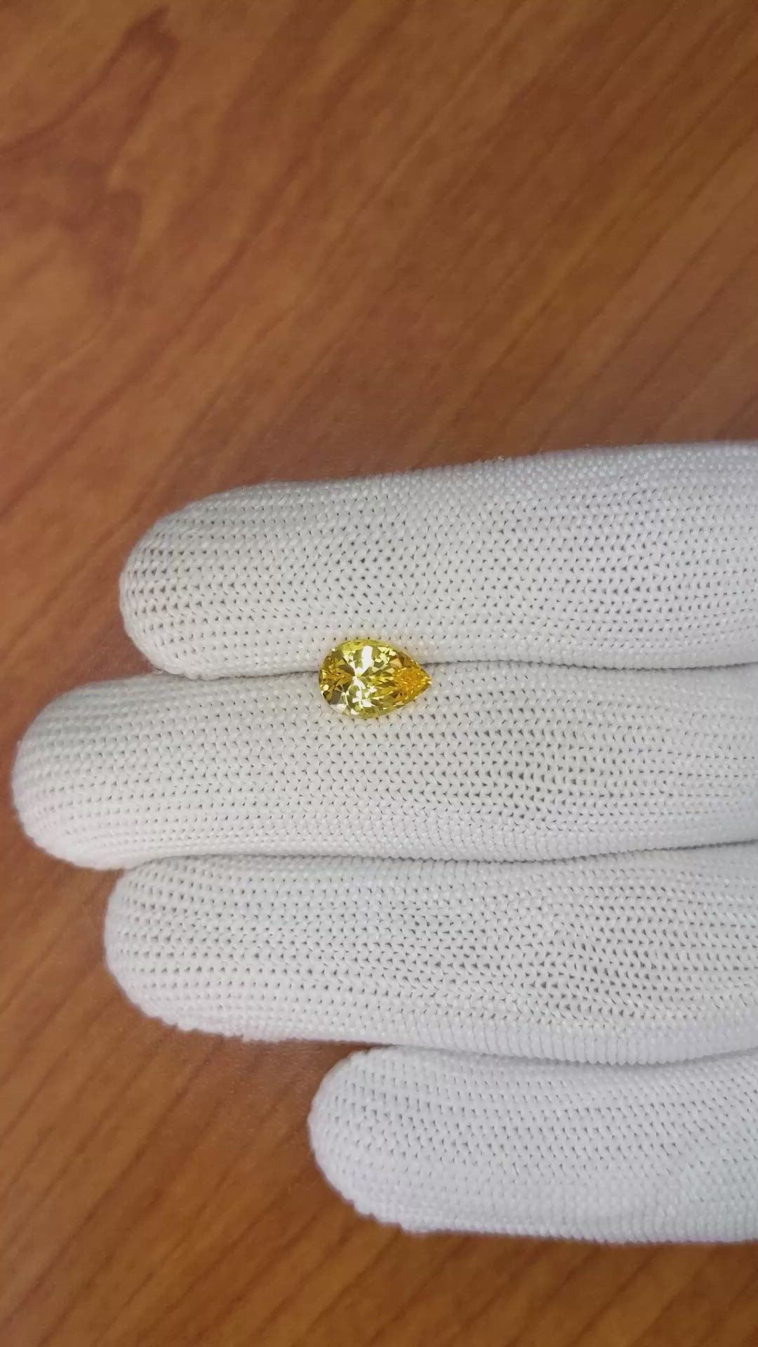 2.09 Ct. Orangish Yellow Sapphire from Ceylon (Sri Lanka) Size Video