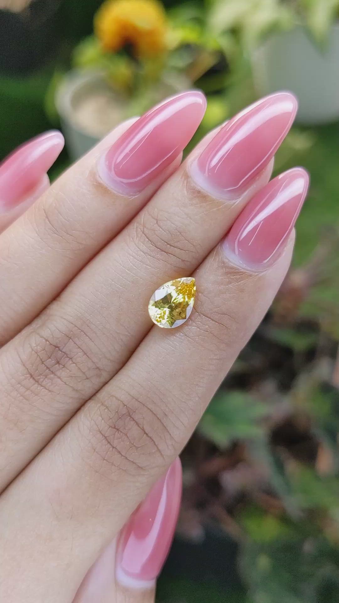 2.09 Ct. Orangish Yellow Sapphire from Ceylon (Sri Lanka) Size Video