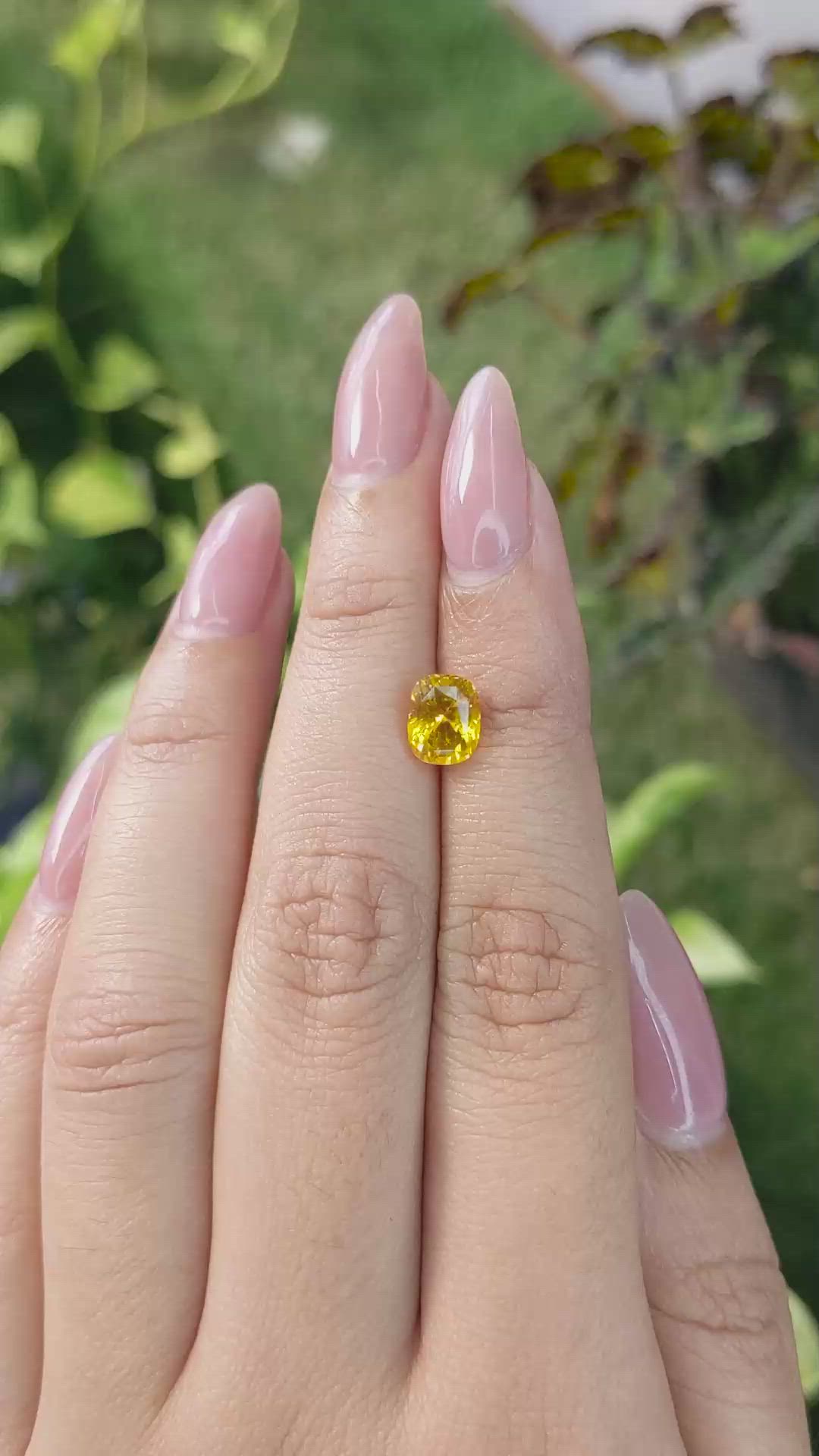 1.98 Ct. Orangish Yellow Sapphire from Ceylon (Sri Lanka) Size Video