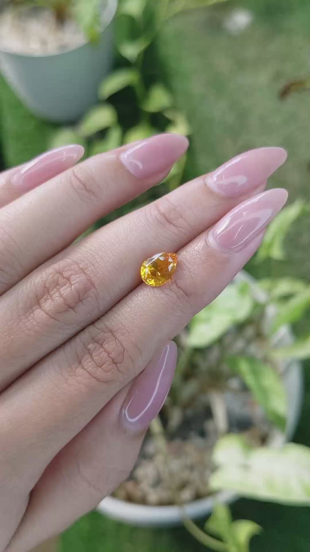 2.19 Ct. Yellowish Orange Sapphire from Ceylon (Sri Lanka) Size Video
