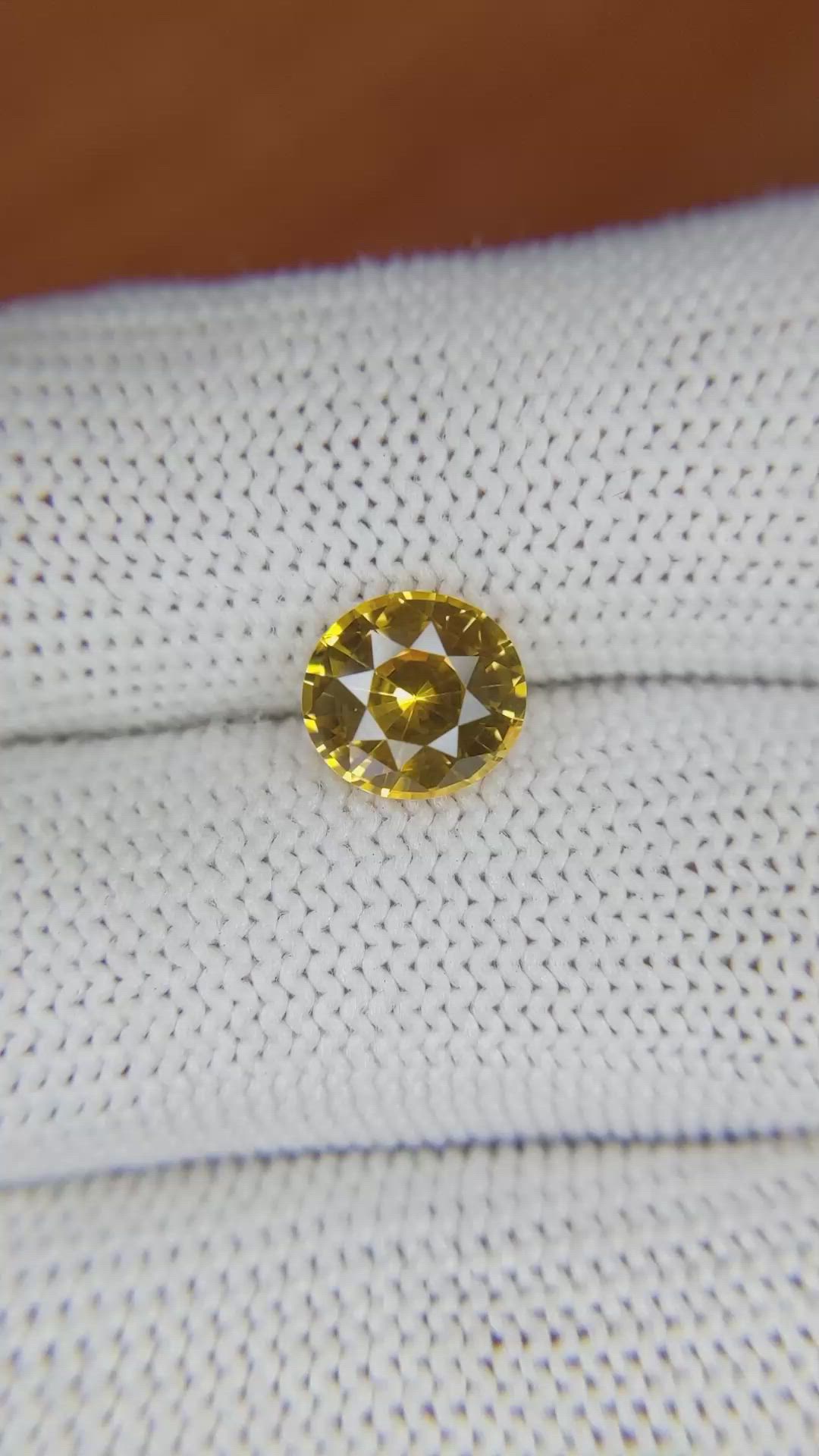 2.28 Ct. Orangish Yellow Sapphire from Ceylon (Sri Lanka) Size Video