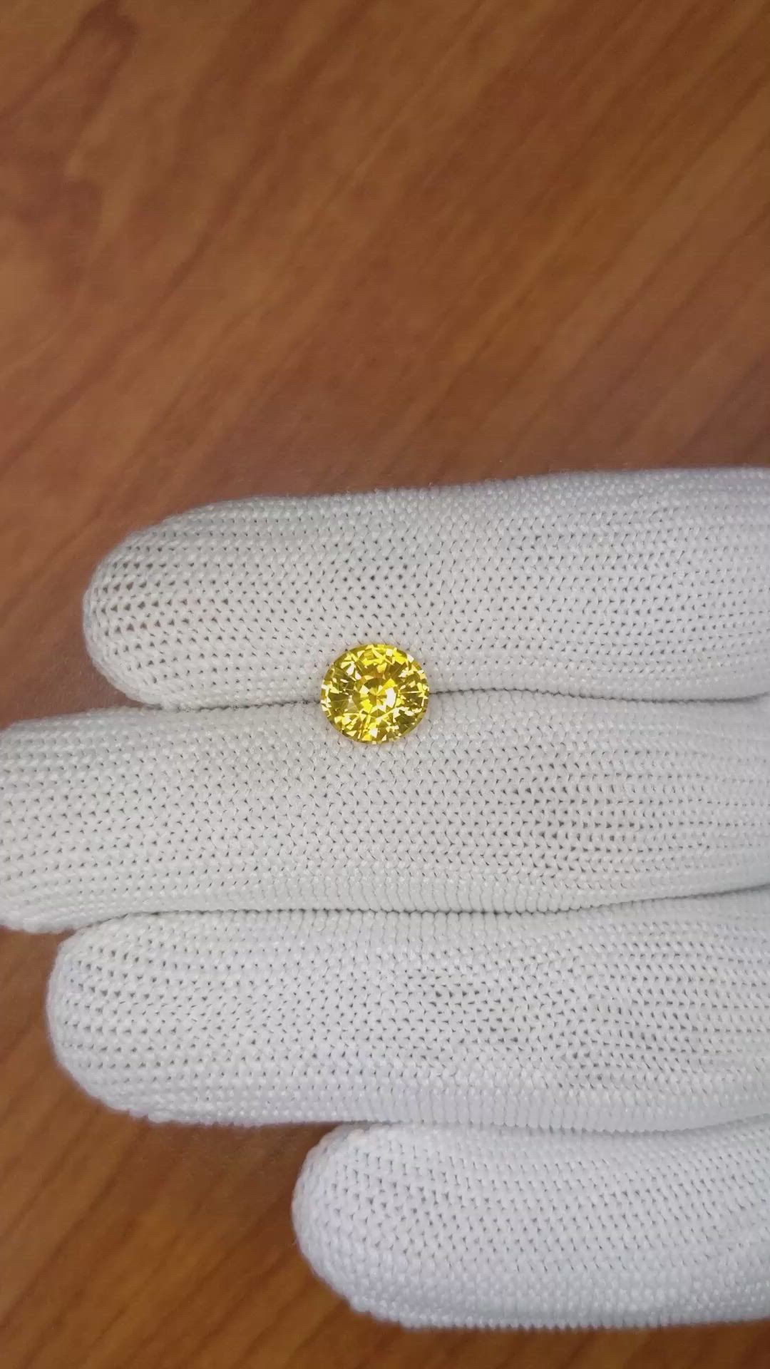 2.28 Ct. Orangish Yellow Sapphire from Ceylon (Sri Lanka) Size Video