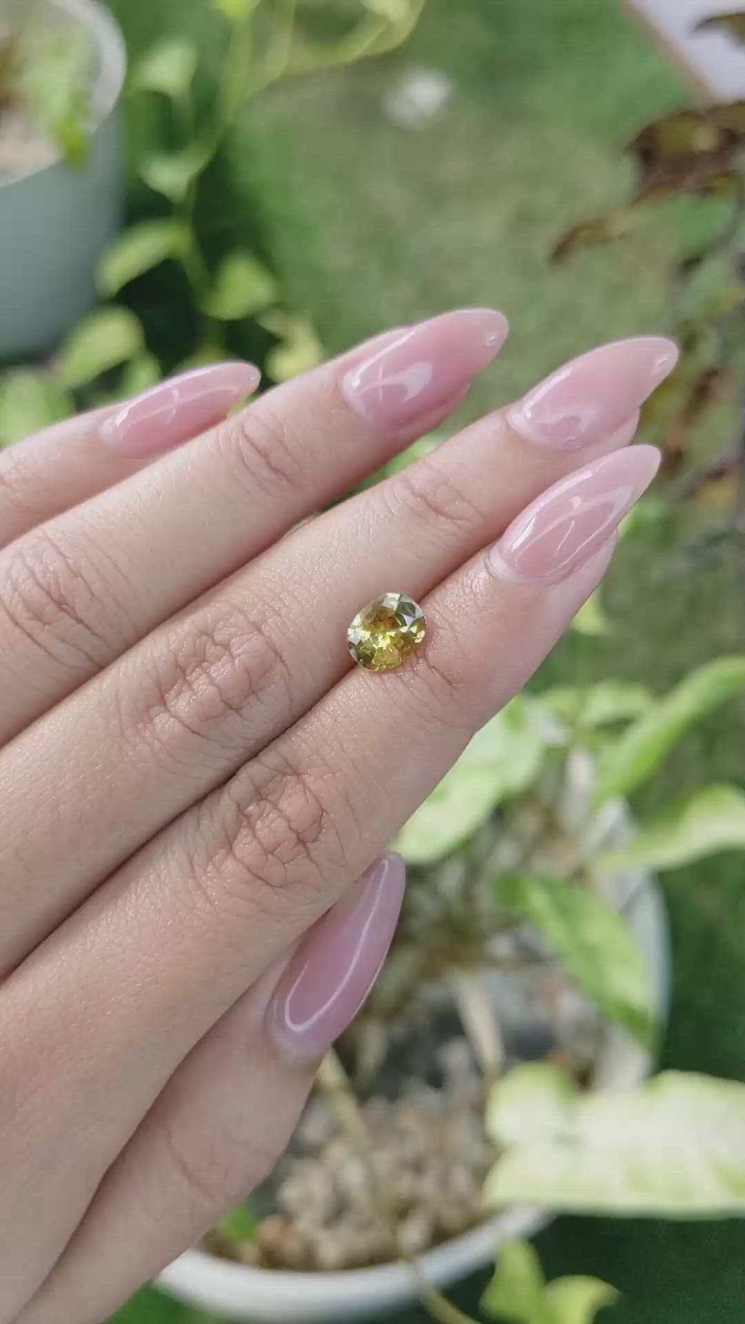 1.49 Ct. Orangish Yellow Sapphire from Ceylon (Sri Lanka) Size Video