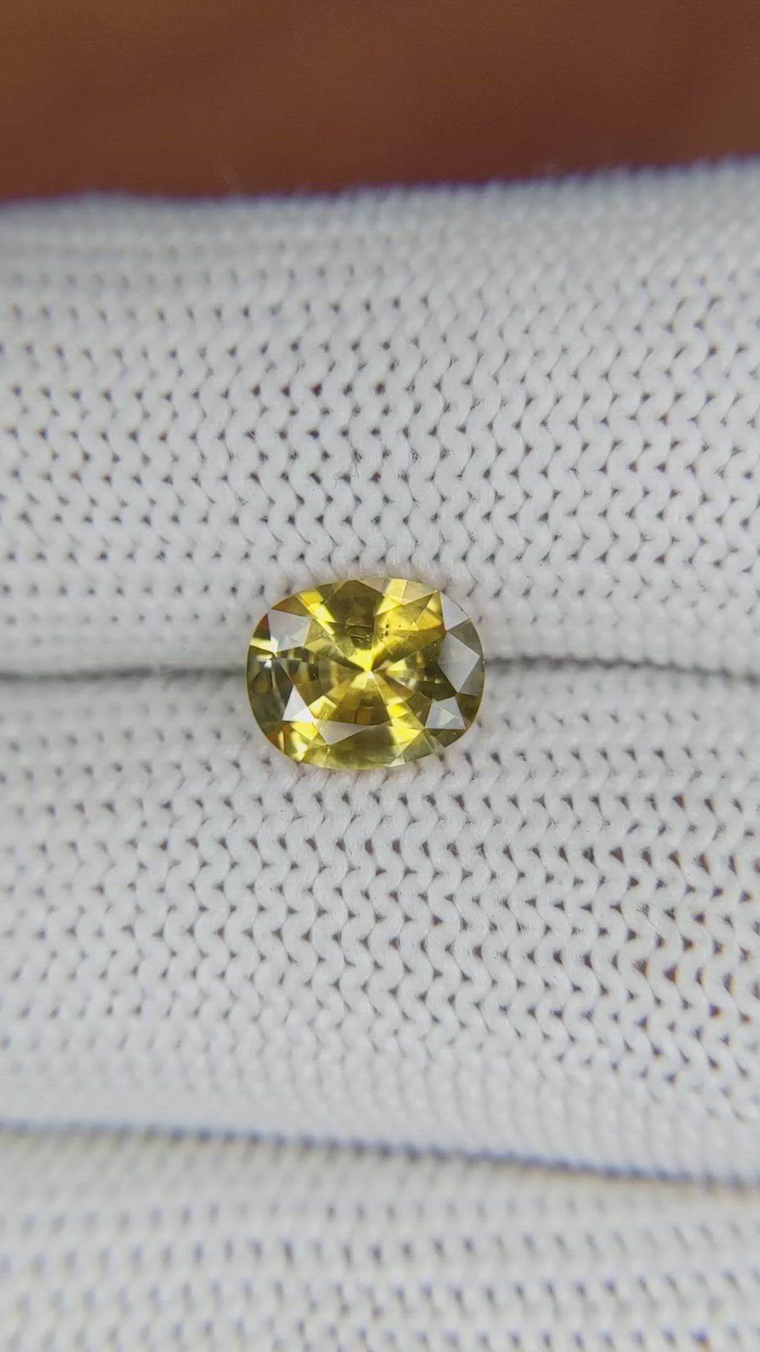 1.49 Ct. Orangish Yellow Sapphire from Ceylon (Sri Lanka) Size Video
