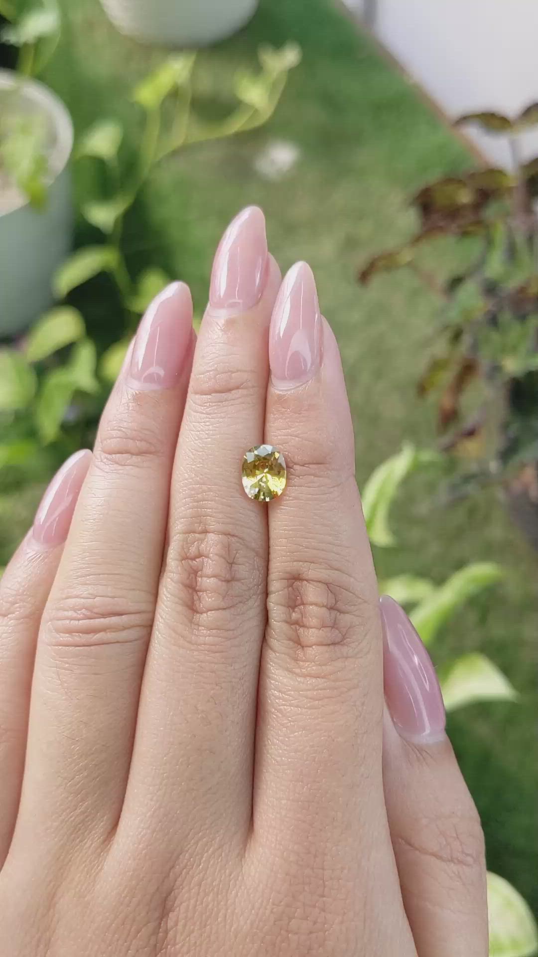 1.49 Ct. Orangish Yellow Sapphire from Ceylon (Sri Lanka) Size Video