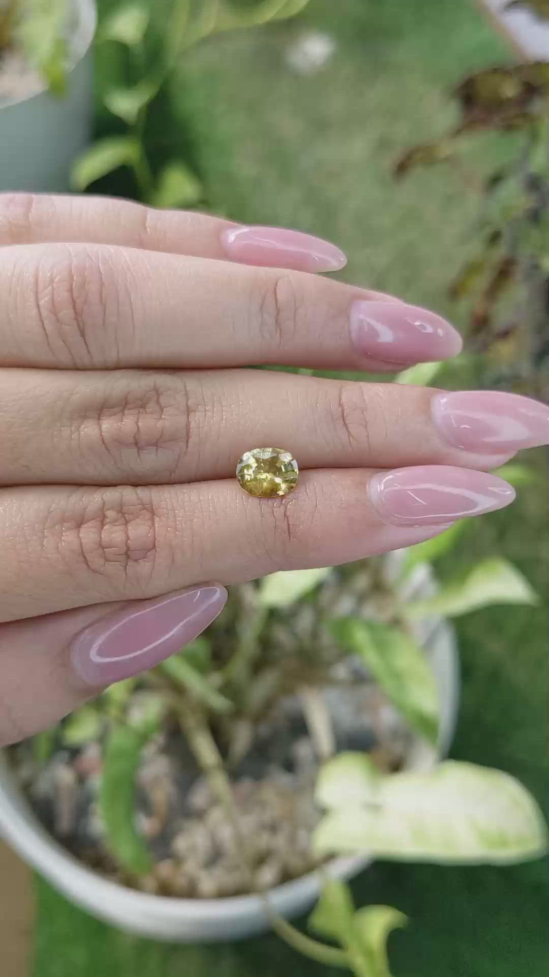 1.49 Ct. Orangish Yellow Sapphire from Ceylon (Sri Lanka) Size Video