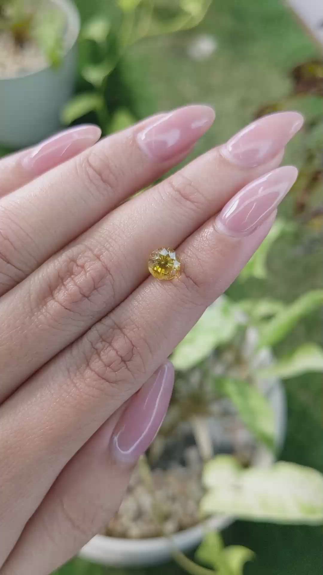1.89 Ct. Orangish Yellow Sapphire from Ceylon (Sri Lanka) Size Video