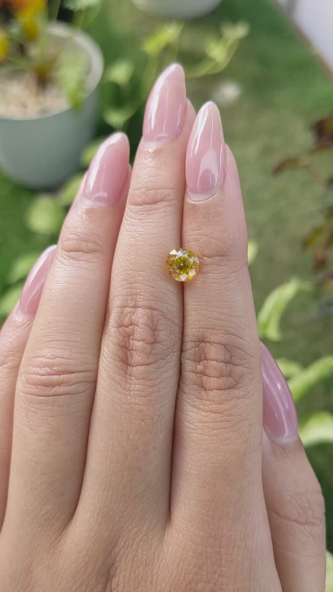 1.89 Ct. Orangish Yellow Sapphire from Ceylon (Sri Lanka) Size Video