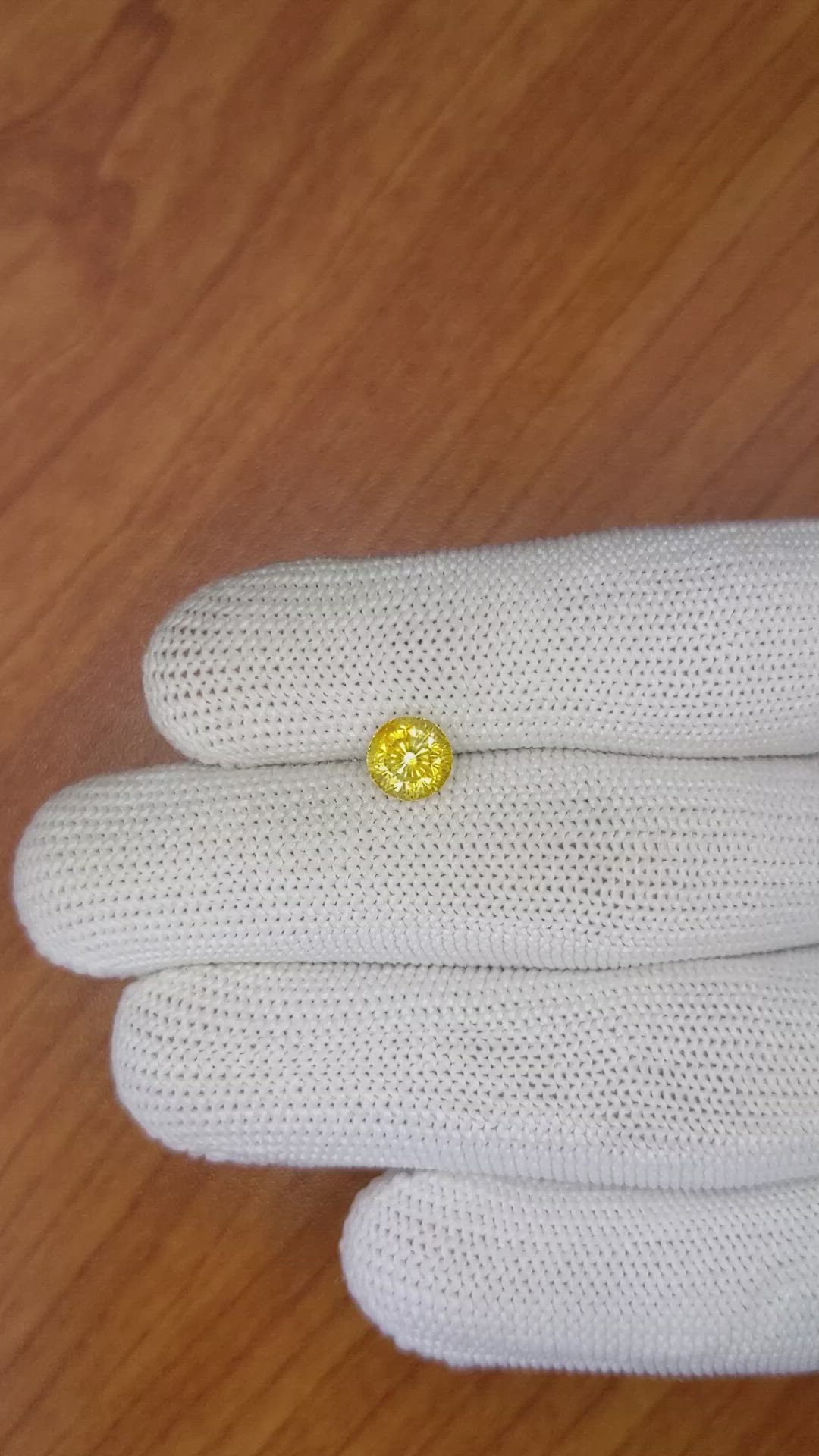 1.89 Ct. Orangish Yellow Sapphire from Ceylon (Sri Lanka) Size Video