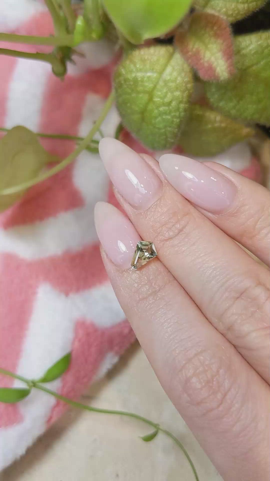 0.99 Ct. Yellowish Green Sapphire from Montana Size Video