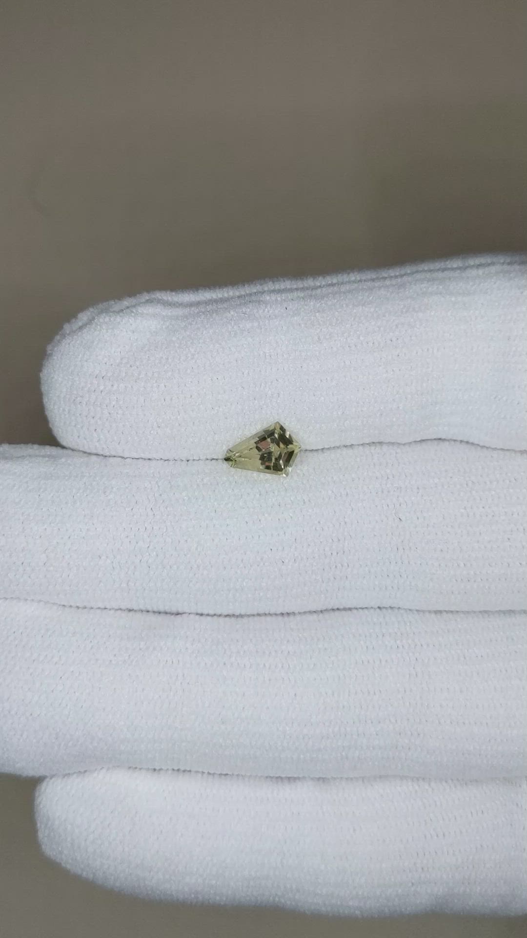 0.99 Ct. Yellowish Green Sapphire from Montana Size Video