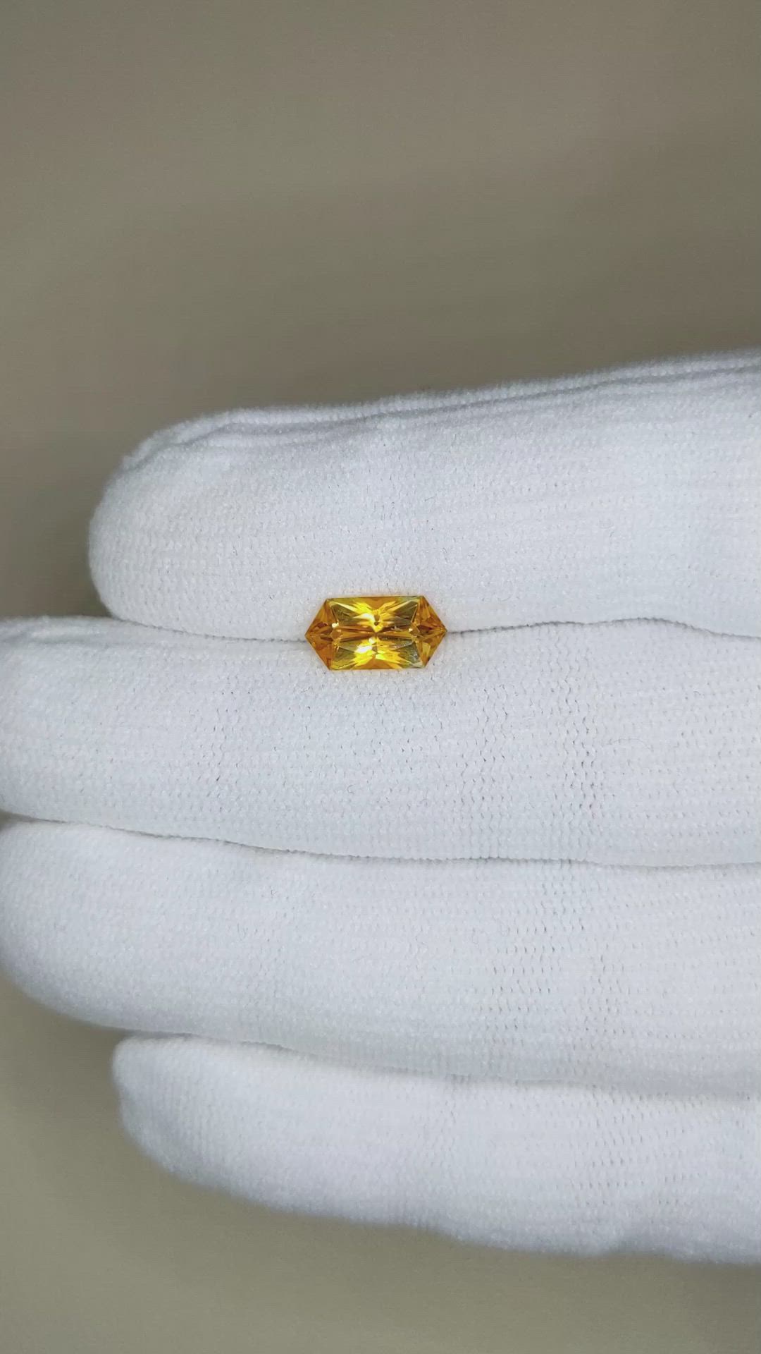 1.57 Ct. Yellowish Orange Sapphire from Montana Size Video