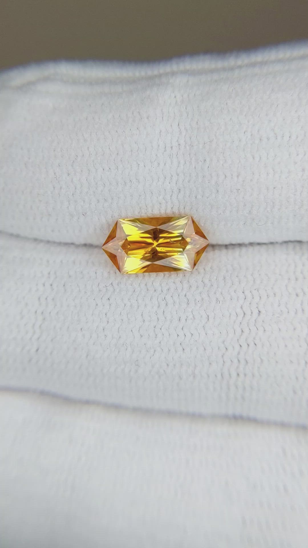 1.57 Ct. Yellowish Orange Sapphire from Montana Size Video