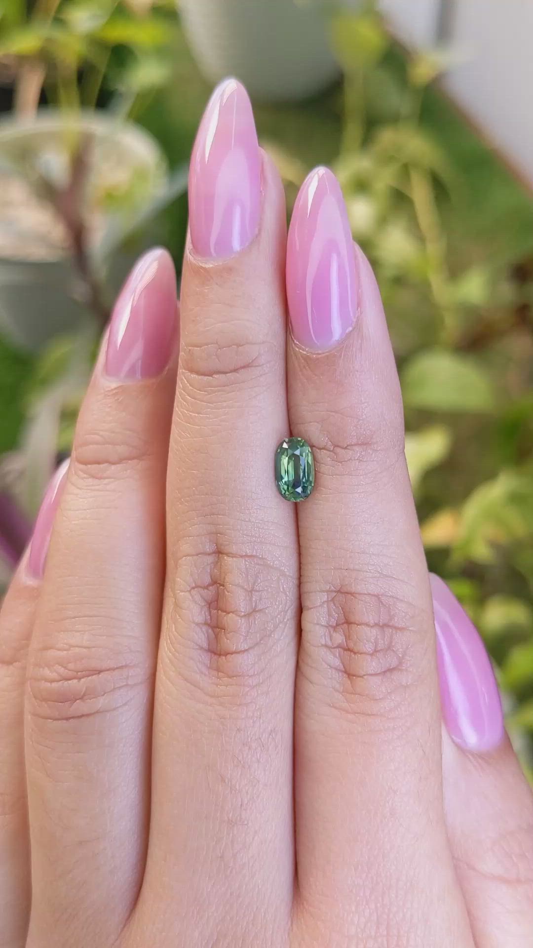 0.97 Ct. Yellowish Green Sapphire from Madagascar Size Video