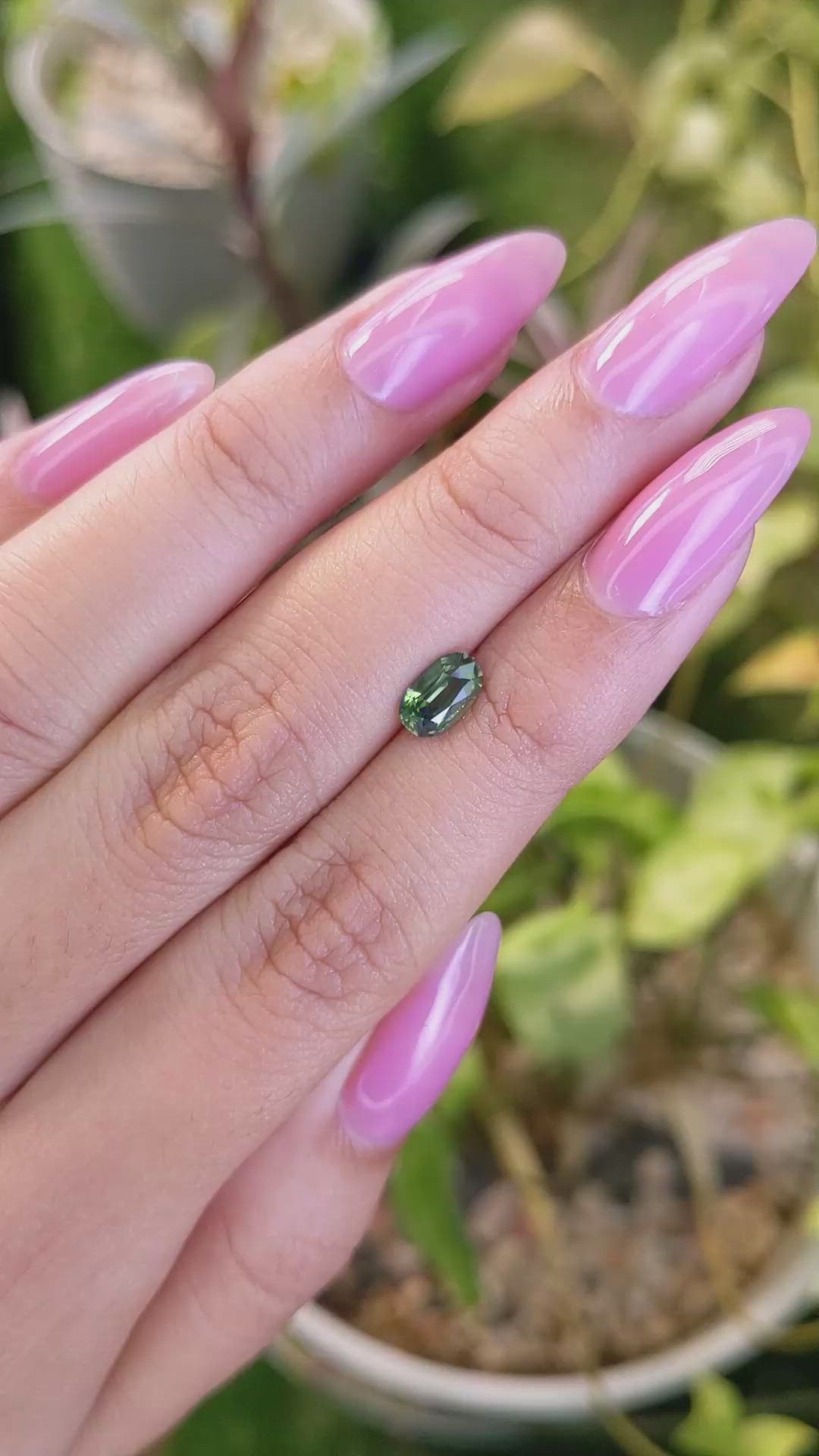 0.97 Ct. Yellowish Green Sapphire from Madagascar Size Video