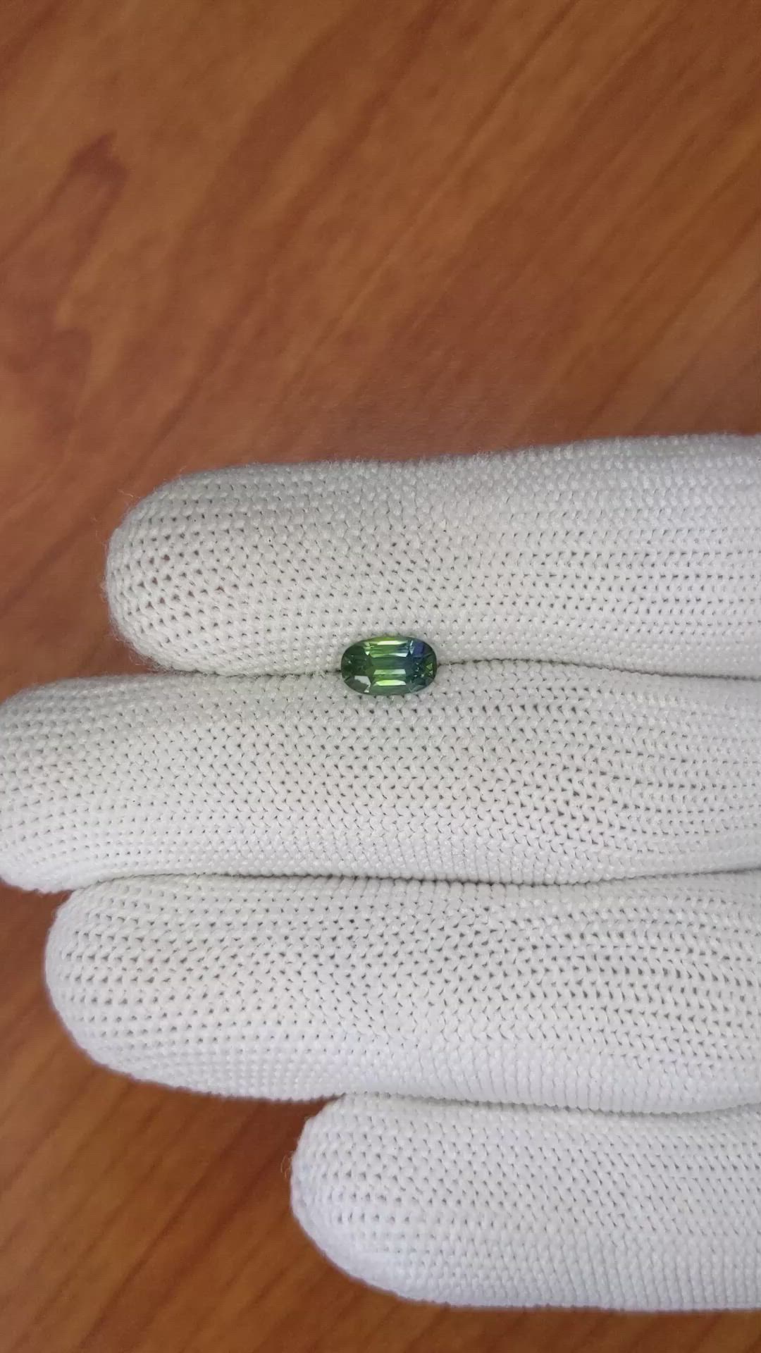 0.97 Ct. Yellowish Green Sapphire from Madagascar Size Video