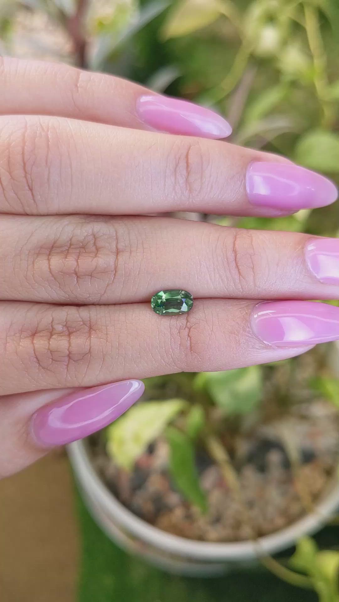 0.97 Ct. Yellowish Green Sapphire from Madagascar Size Video