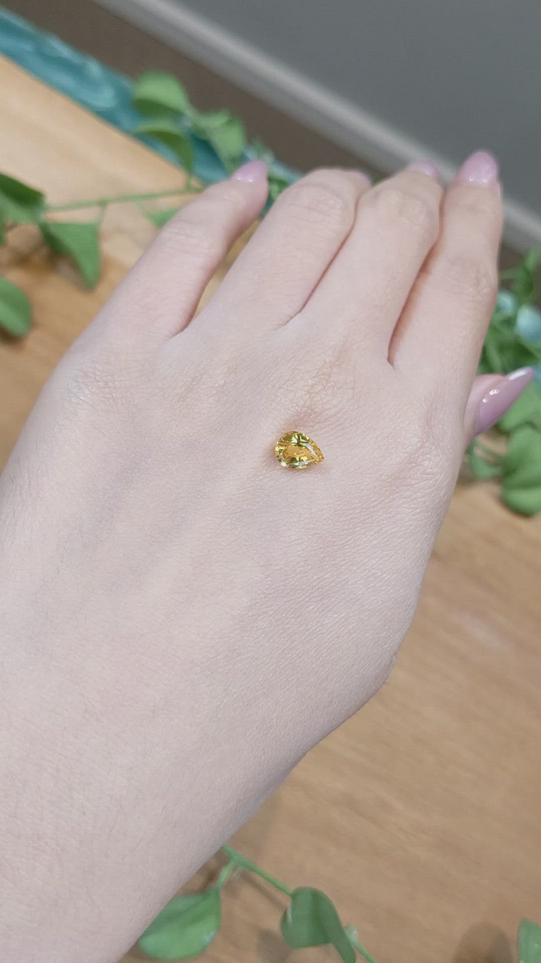 1.37 Ct. Orangish Yellow Sapphire from Ceylon (Sri Lanka) Size Video