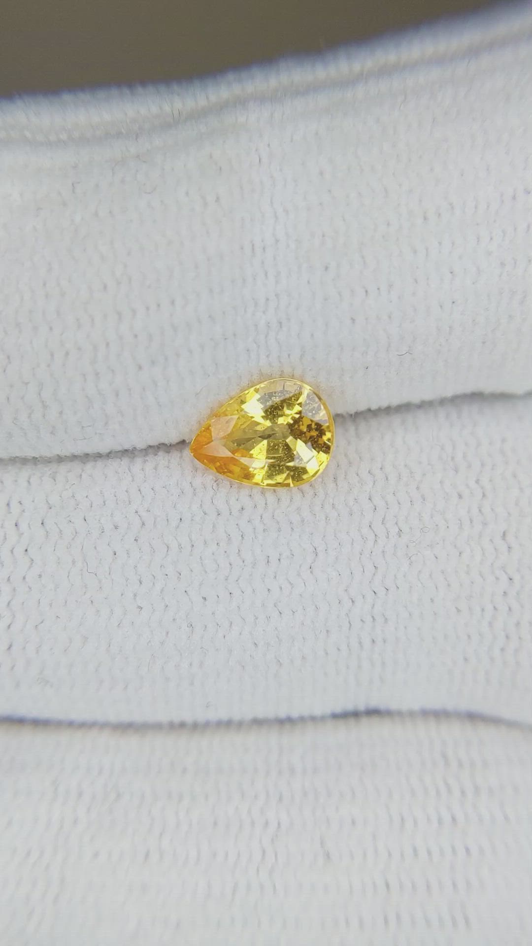 1.25 Ct. Orangish Yellow Sapphire from Ceylon (Sri Lanka) Size Video