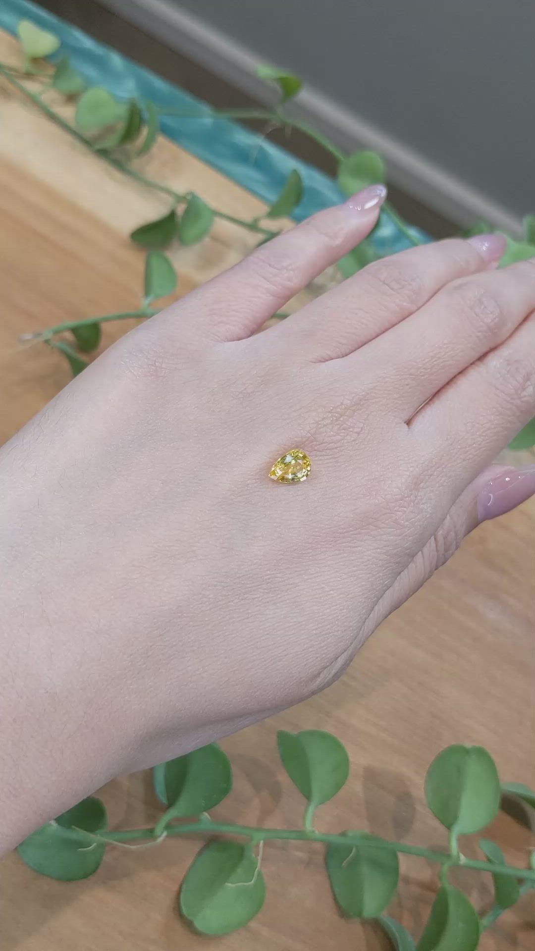 1.25 Ct. Orangish Yellow Sapphire from Ceylon (Sri Lanka) Size Video